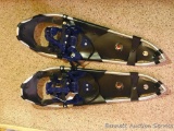 Pair of Crescent Moon aluminum snowshoes. Both show little to no usage wear. Measures 31.5 in. Long