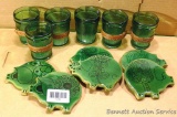 Six vintage green drink glasses along with six ceramic pig coasters by Fidel Bofill. Glasses measure