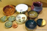 Ceramic bowls and ashtrays, wooden trinket holder, more. Some pieces marked Jerry Weicham. All
