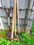 Swing-style weeder, 2-1/2 tined pitchfork, flat bottom shovel - handle needs repair, mattock with