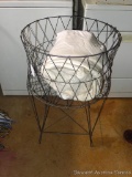 Nice wire laundry stand collapses for easy transport or storage. Would be great by the clothesline