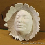 Ceramic piece by Irene. Back is marked ?self? so we think that this is Irene's face! In