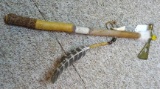 Decorative tomahawk has beaded and feather accents, 22