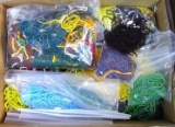 A few pounds of bead strings ready to be sorted and used.