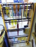 Wooden bead rack with many sets of beads. Rack measures 23 in. wide x 46 in. tall. NO SHIPPING on