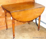 Pretty little antique drop leaf table is either 2' x 3-1/2' or 3-1/2' x 4-1/2' depending on leaf