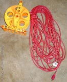 Long extension cord with good ends. Coil is 2-1/2' as pictured. Comes with a reel.