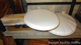 Scalloped shell and other toilet seat, brass toned bath fixtures, condensation drip pan.