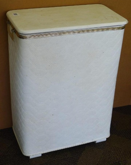 Clothes hamper is 21" x 12" x 28". Has some small stains and nicks in plastic finish.