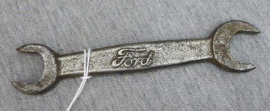 Ford open end wrench 5-1/2" long. Has Ford insignia on it.