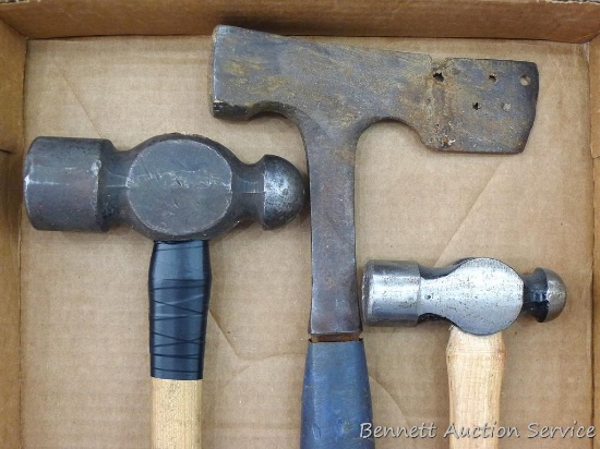 Two ball peen hammers, handles are in good shape; hatchet, head has been welded.