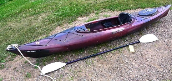 Old Town Dirego 120 kayak with paddle. Kayak is 146" long. Has fold down seat and storage