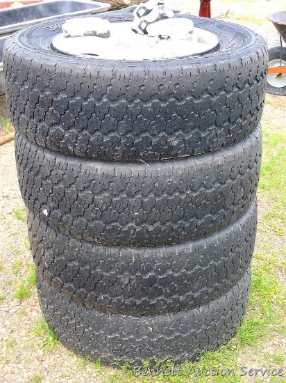 Four Good Year Wrangler tires size P275/65R18. Rims came from a 2007 Toyota Tundra, center to center