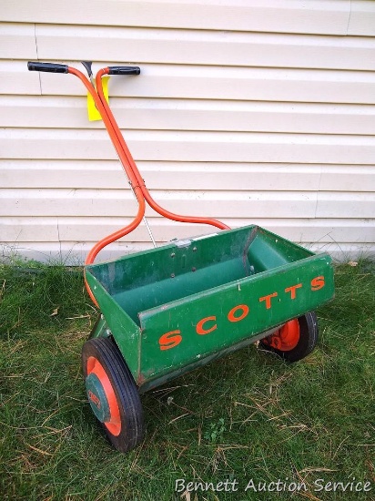 Scotts adjustable drop spreader with 20" bin.