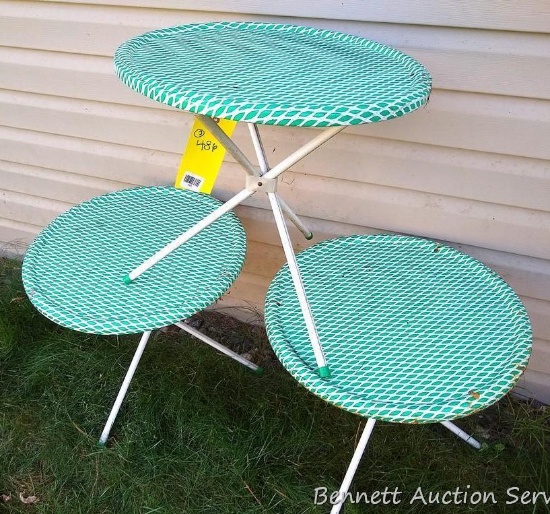 Three cute little retro metal side tables are 19" diameter. One is wired together.