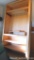 Large sturdy gun or fishing pole cabinet is approx 44