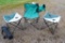 Two folding Pinnacle camp tables and a couple of folding chairs. One chair is sturdy but has a