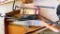 Buck Wing bow holder with arrow tube, gambrel hook, brush saw, more. Hook is 24