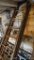 Wooden ladder by American Ladder Institute is in 3 sections that pull apart or extend. Each section