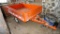 Large utility trailer with hand pump hydraulic dump is of all steel construction. Box is 53