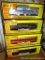 Four Rail King model trains with original boxes. All trains look to be in good condition, tears