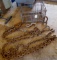 Two lengths of chain, U-hook, and a metal crate. Longer length of chain has 3