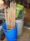 Three barrels, metal crate, 4' stakes, and a bucket. Largest barrel is 18