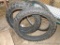 Continental Twinduro tubeless dirt bike tires. One is marked 