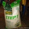 Scotts Step 1 Lawn Pro crabgrass preventer plus fertilizer. 42 lb bag looks unopened.
