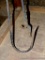 Nice fireplace poker, plus a gaff hook. Longer is 50