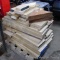 Stack of hardwood pieces, assorted sizes. Whole pile is approx. 32