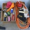 Extension cord, oil can, gloves, metal handle claw hammer, tape measure, pliers, funnel and more.