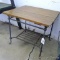 Cute little table with cast iron base measures 21