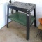 Universal metal framed base has a metal shelf; measures 25