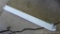 Light fixture; measures 4' long. Takes smaller bulbs.