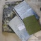 Cabela's and other tarps, four in all. NIP 6' x 8' tarp is UV resistant. Camo tarp is about 110