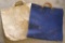 LL bean firewood carrier and a large canvas tote bag. When firewood carrier is folded in half, both