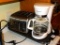 Brushed stainless Toastmaster four slice toaster, Black & Decker 12 cup coffee maker, and Presto