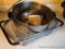 Heavy duty strainer with expanding side arms; stainless steel strainer is nearly 10