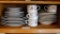 Rosebud dishes including six dinner plates, eight soup bowls, seven salad or dessert plates, seven