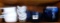 Eight matching, and one other corn cob serving dishes, plus several sets of cob picks; Five blue