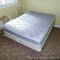 Bed is upstairs, please bring help to remove. Full sized mattress and box spring. Mattress is in