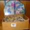 Box of newer and older clothespins and a Bluebird thermometer. Thermometer is 12