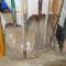 Heavy scoop shovel; 2 nice spade shovels, one with fiberglass handle; rake; hoe and weed cutter.