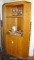 Corner cabinet is made of oak and in good condition. Measures 71