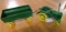 Two Ertl die cast John Deere toys. Steel wheel tractor replica has 5700-9415 and 5700-9216 on
