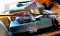 Crossbow items including cocking rope, one arrow, red dot scope. Also included are some archery