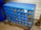 Metal storage cabinet has 40 compartments and is 12