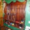 Impressive custom built wall-mounted gun rack is nearly 5' wide and is over 5' tall. Bring a