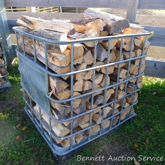 Metal crate filled with mixed firewood. Crate measures approx. 40" x 46" x 45".
